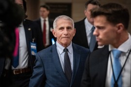 A photo of Anthony Fauci walking inside the U.S. Capitol.
