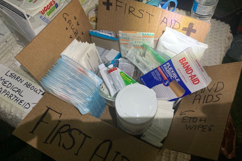 A photo of a cardboard box with first aid supplies.
