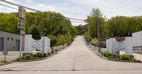 A long driveway at the entrance of Heritage Hills Rehabilitation & Healthcare Center in Smithfield, Rhode Island