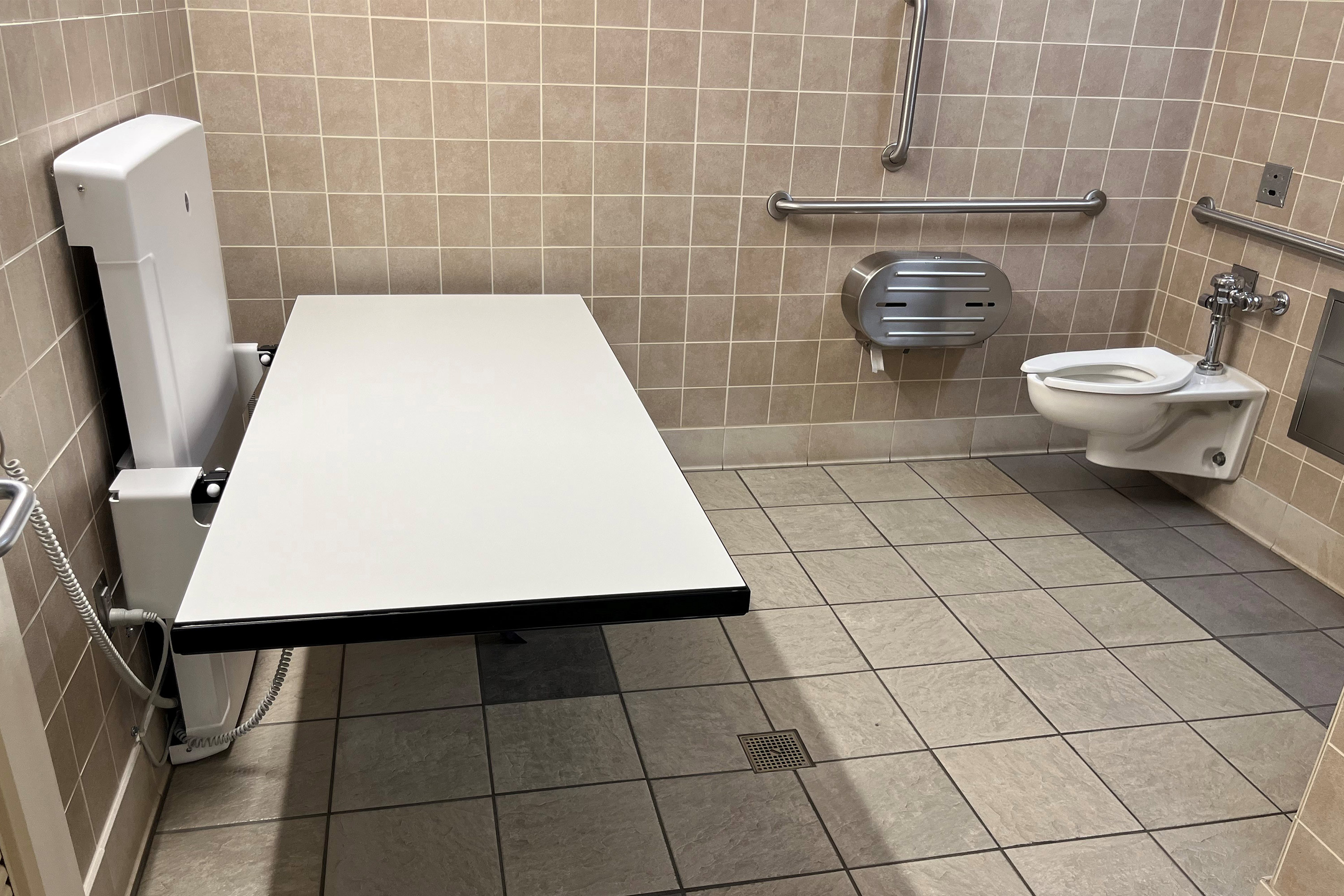 Changing table for restroom online