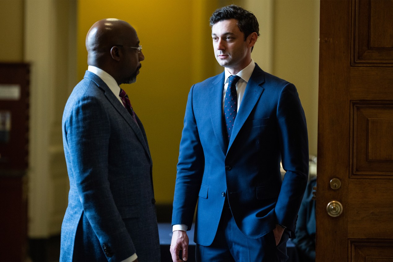 A photo of Sen. Raphael Warnock and Sen. Jon Ossoff at the U.S. Capitol.