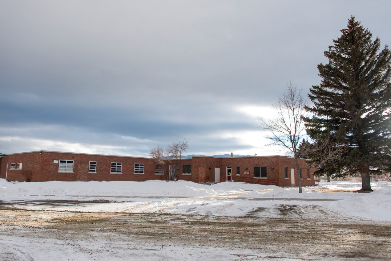 A photo of the exterior of a behavioral health center. Snow covers the ground around it.