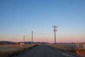 A photo of a rural road.