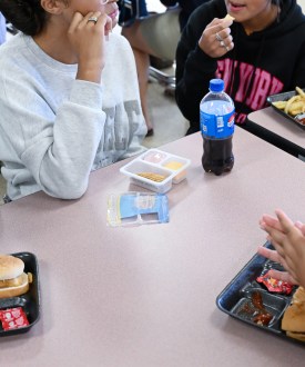 Students eat chicken sandwiches, french fries, and Lunchables at a North Carolina middle school.