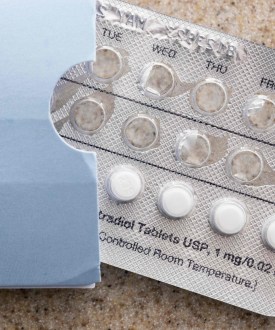 A partially used blister pack of pills is shown on a countertop