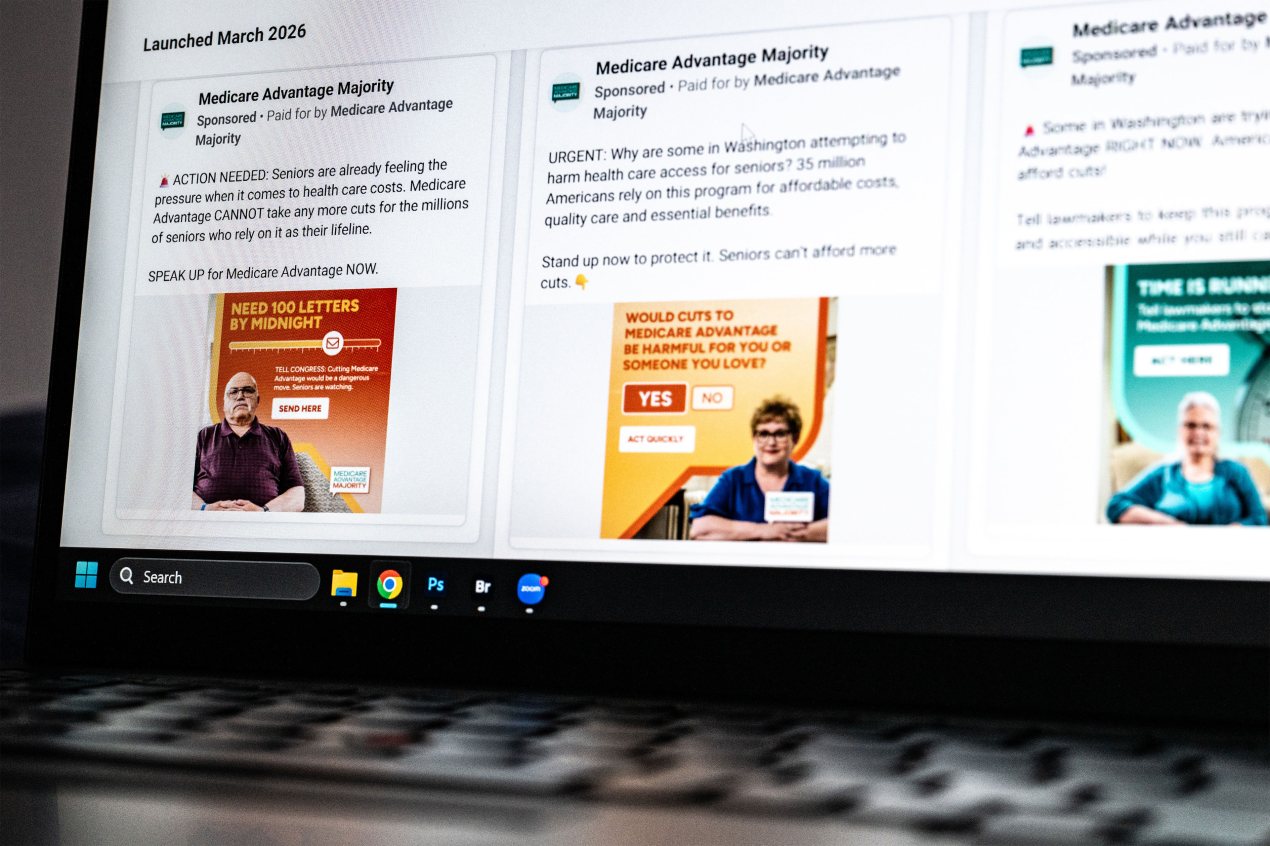 A photo of a laptop screen with Facebook Ad Library open. It shows three ads by Medicare Advantage Majority.