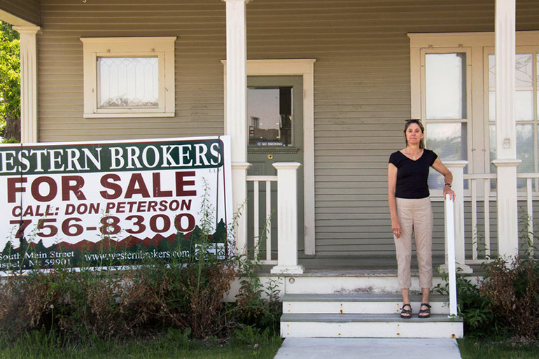 Susan Cahill, owner of All Families Healthcare, stands in front of the first building in Kalispell, Mont., where she offered abortion services. After vandalism closed her last clinic down, Missoula became the nearest place for women in the Flathead Valley to find abortion services. (Photo by Corin Cates-Carney/MTPR)