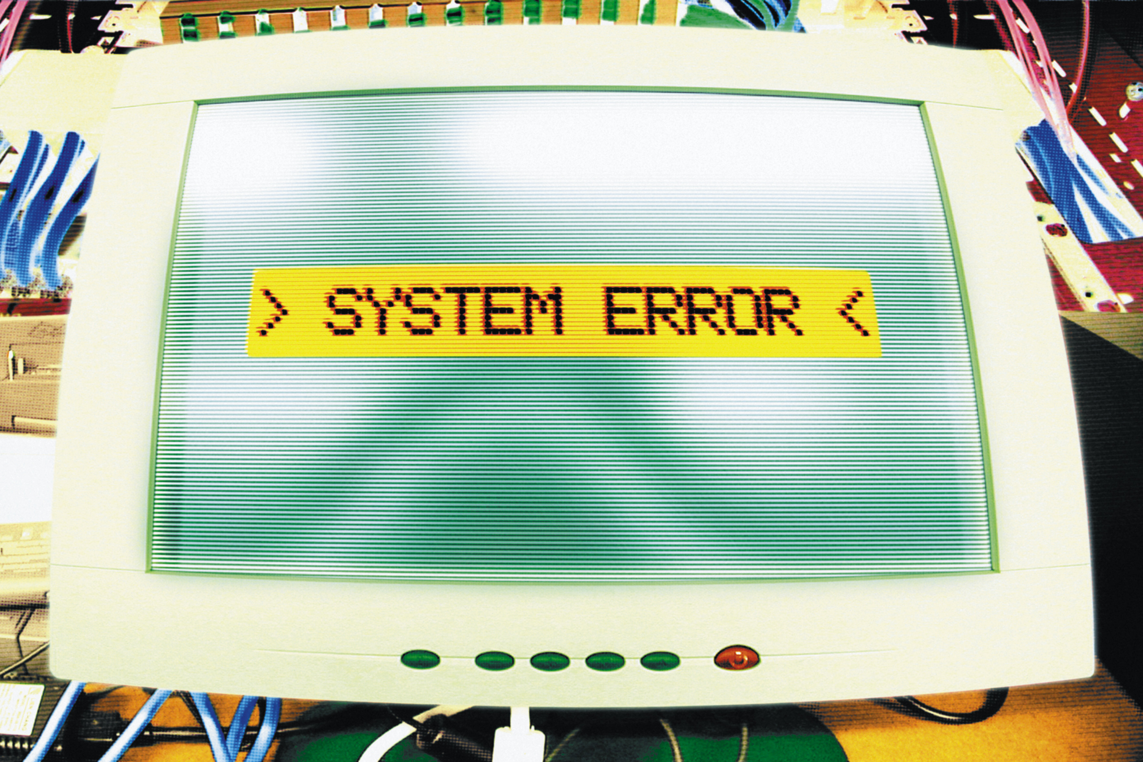 computer screen with error message in yellow reading "system error"