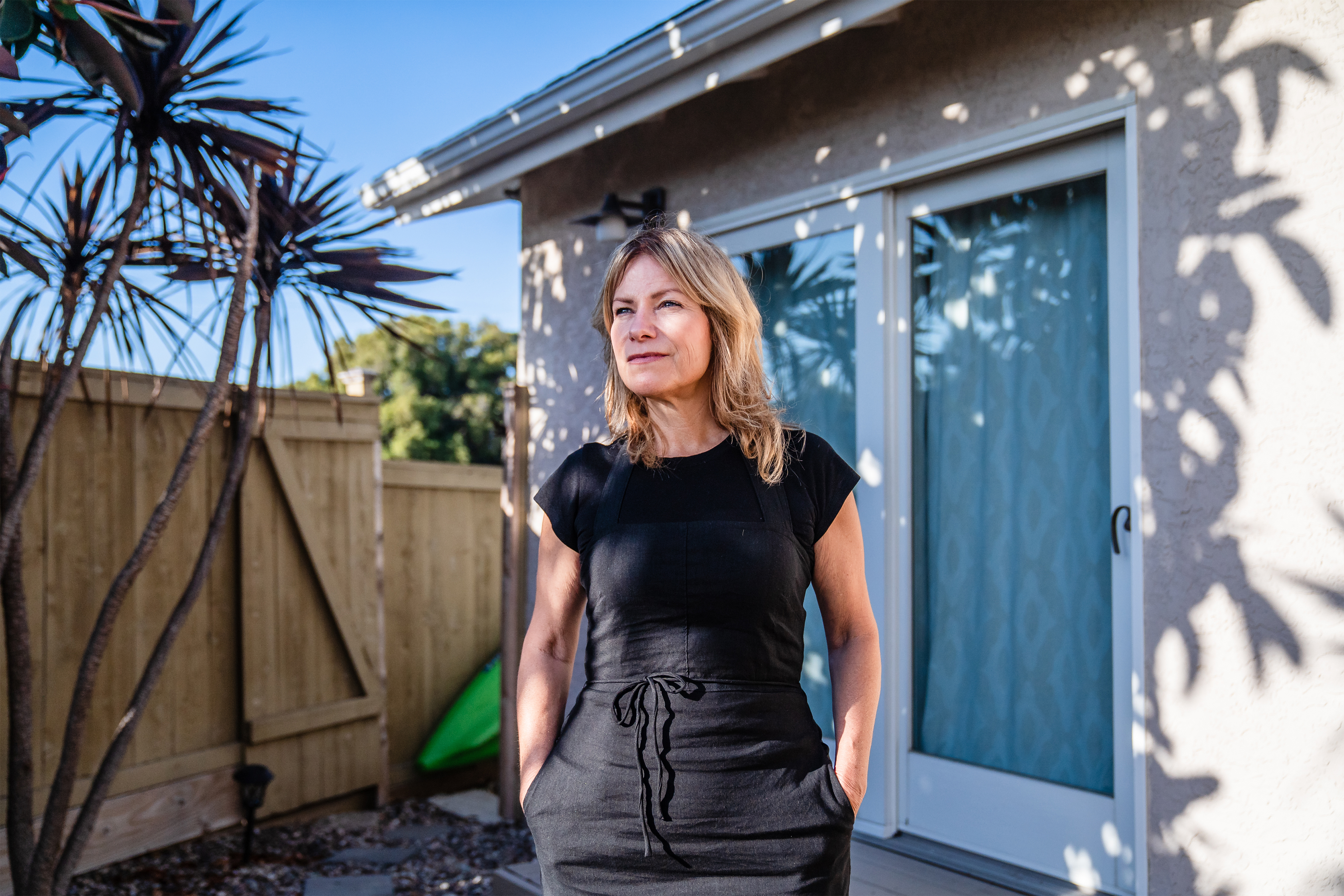 A photo shows Joanne Faryon standing outside. A fence is seen behind her.