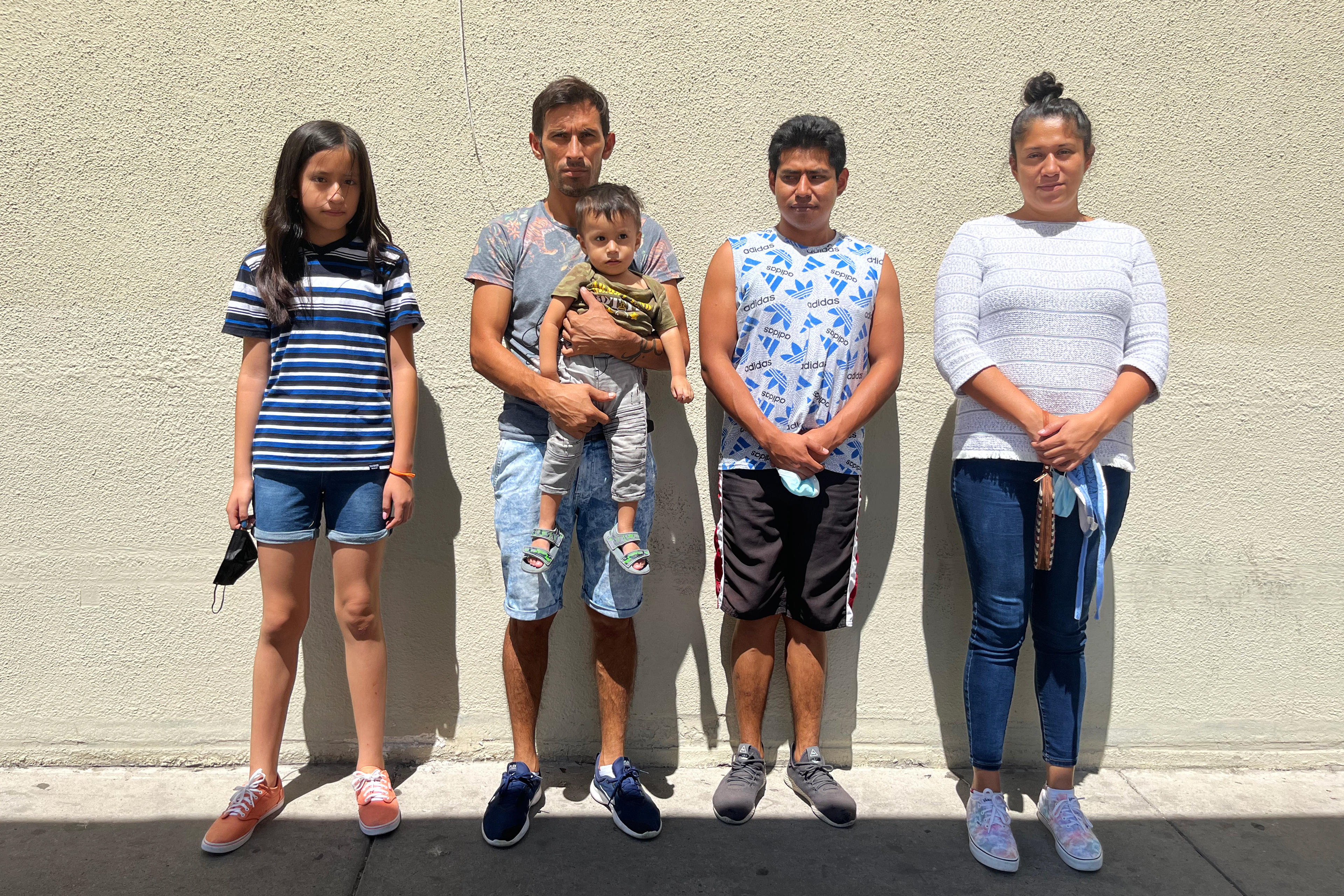 A photo shows Rosa Viridiana Ceron Alpizar and her family standing in front of a wall.