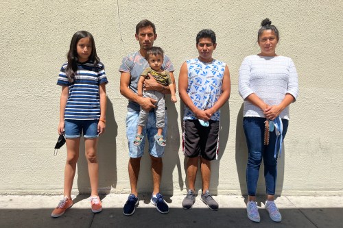 A photo shows Rosa Viridiana Ceron Alpizar and her family standing in front of a wall.