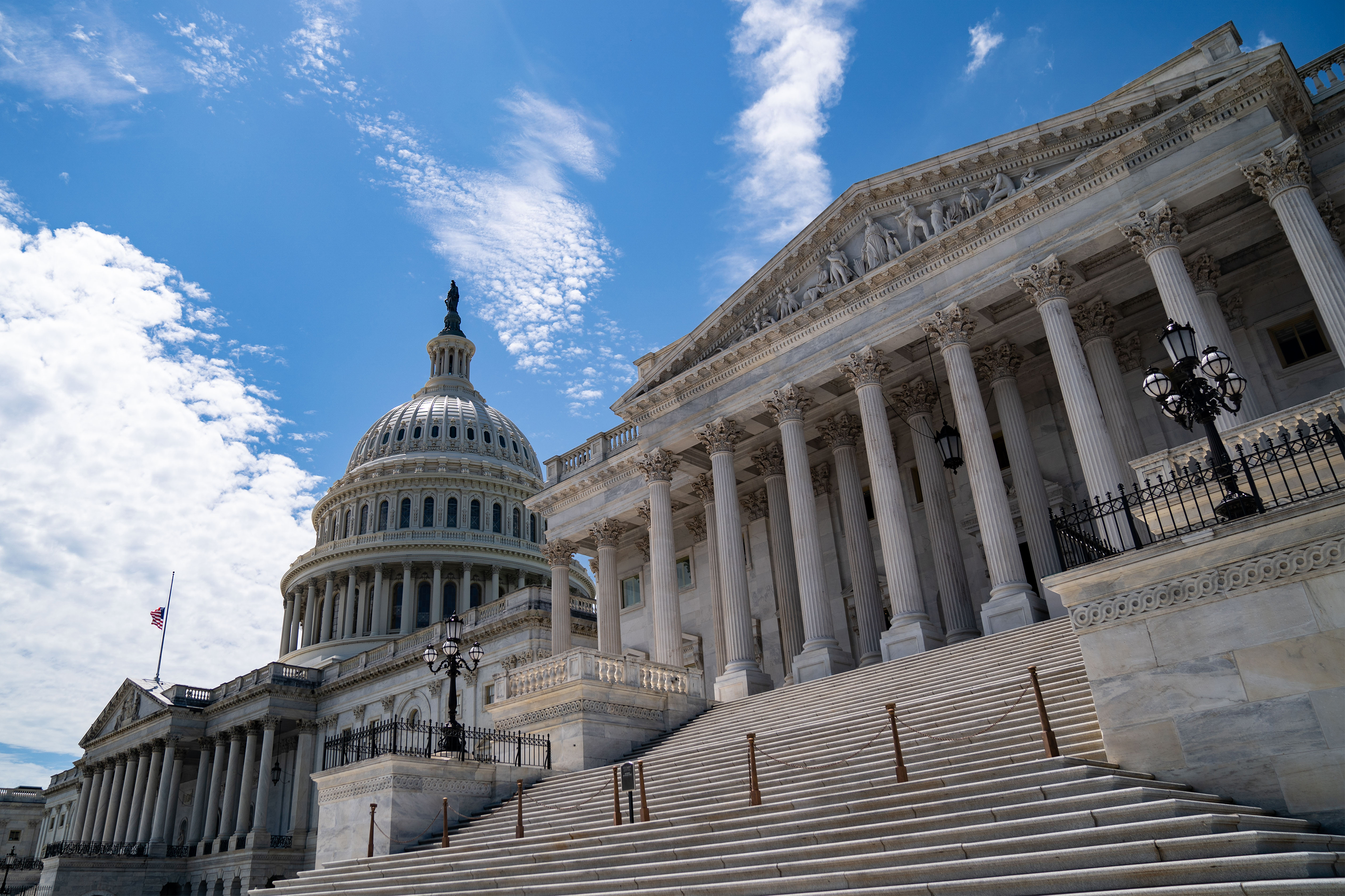 A photo shows the exterior of the U.S. Capitol building.