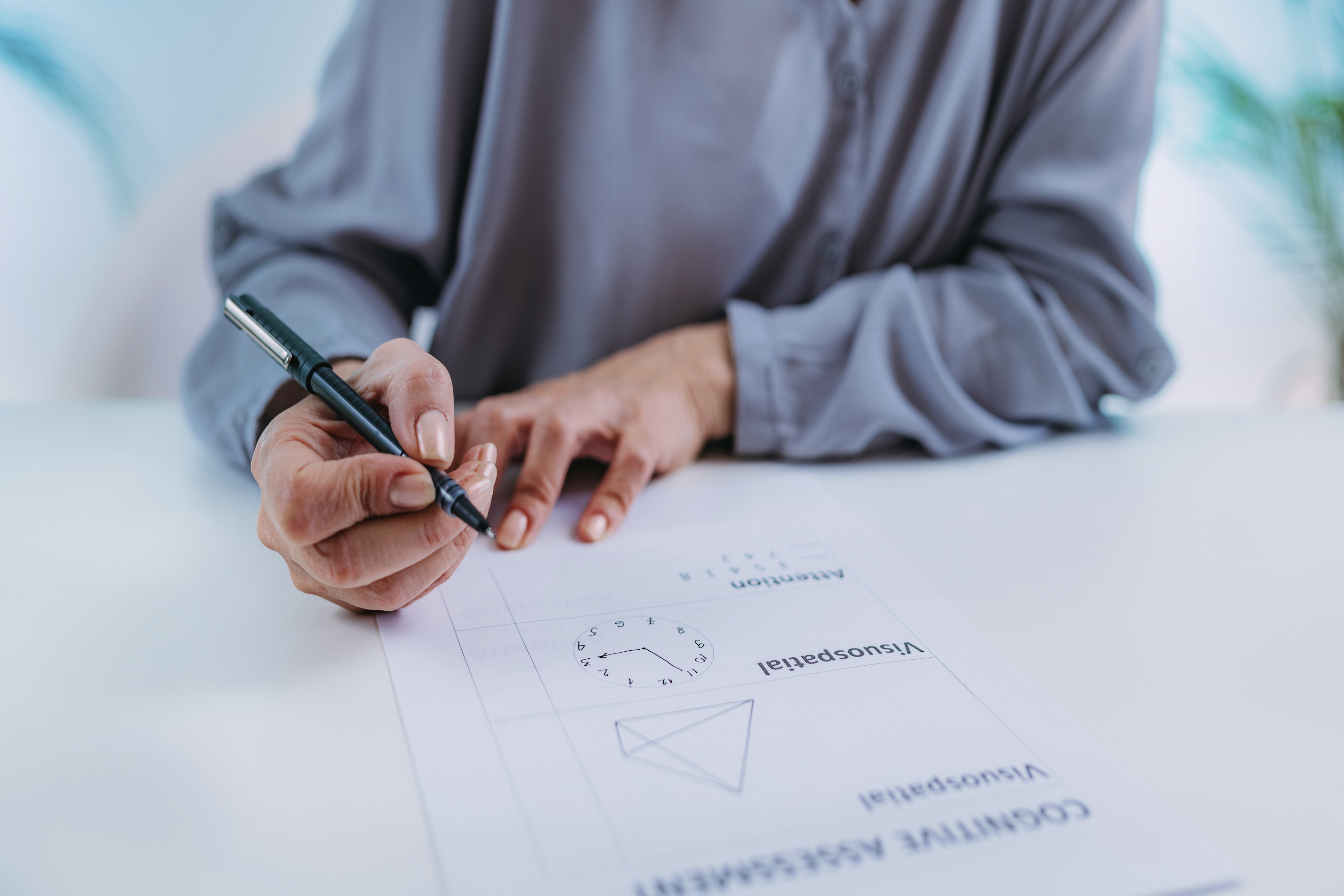 Cognitive test. Senior woman doing cognitive function test.