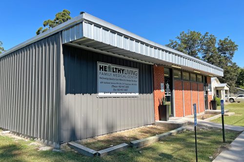 A photo shows the outside of Healthy Living Family Medical Center.