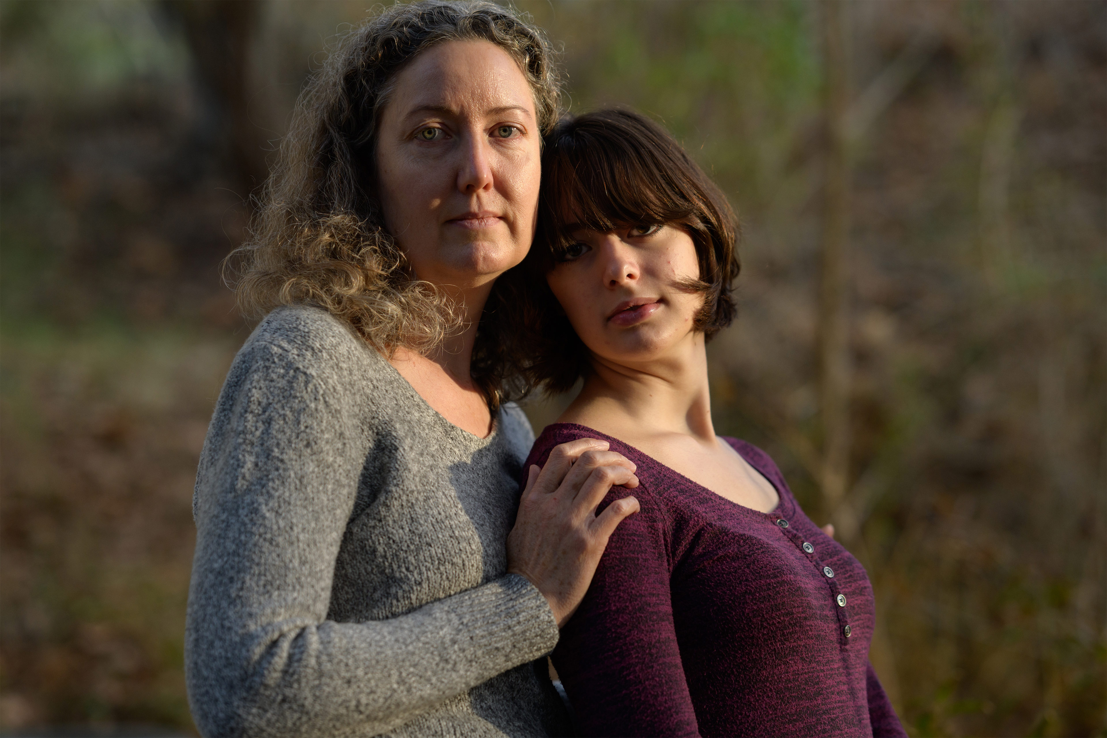 A photo shows Hawley Montgomery-Downs posing with her daughter Bryn outside.