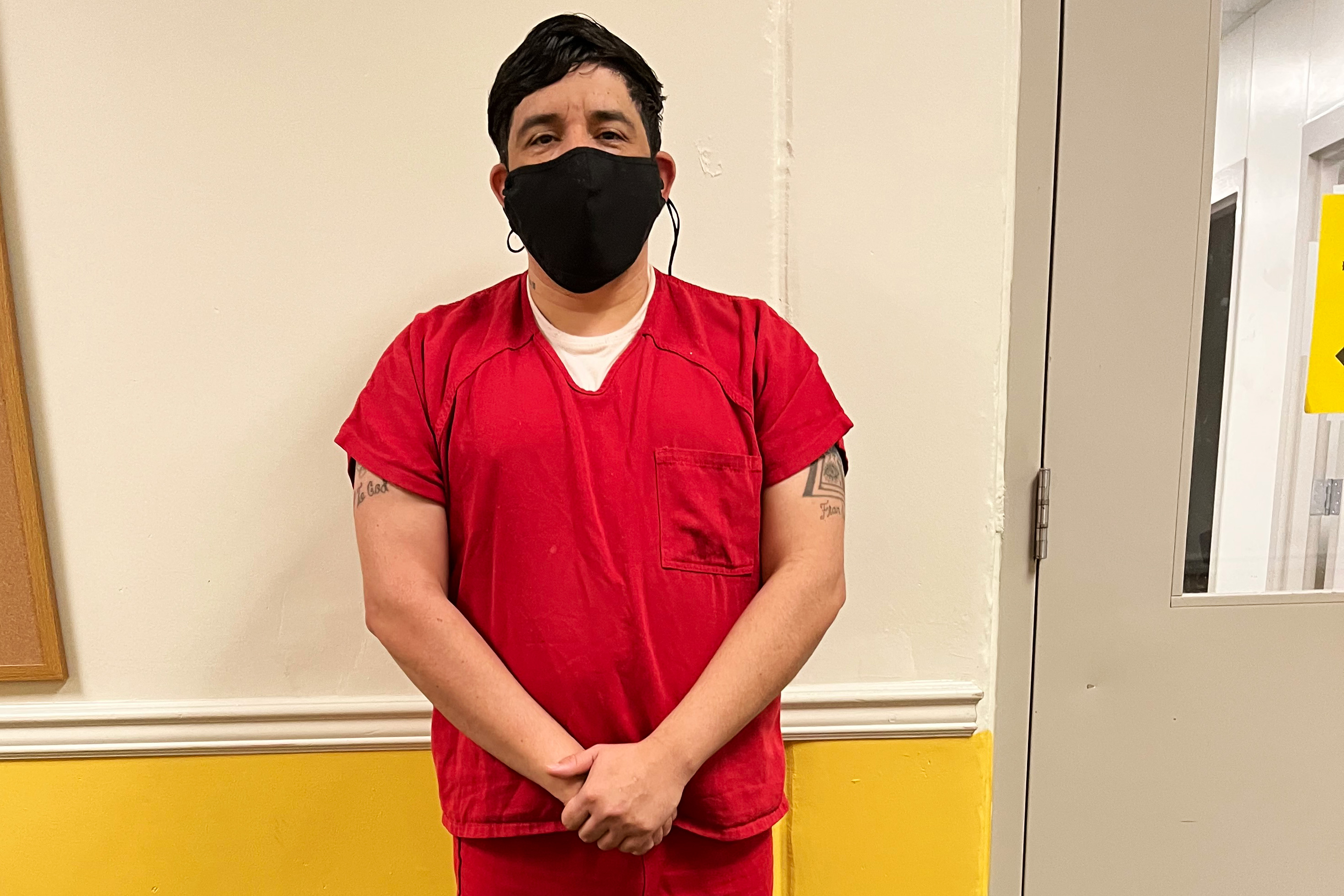 A photo shows Yibran Ramirez-Cecena standing for a photo in Stewart immigration detention center.