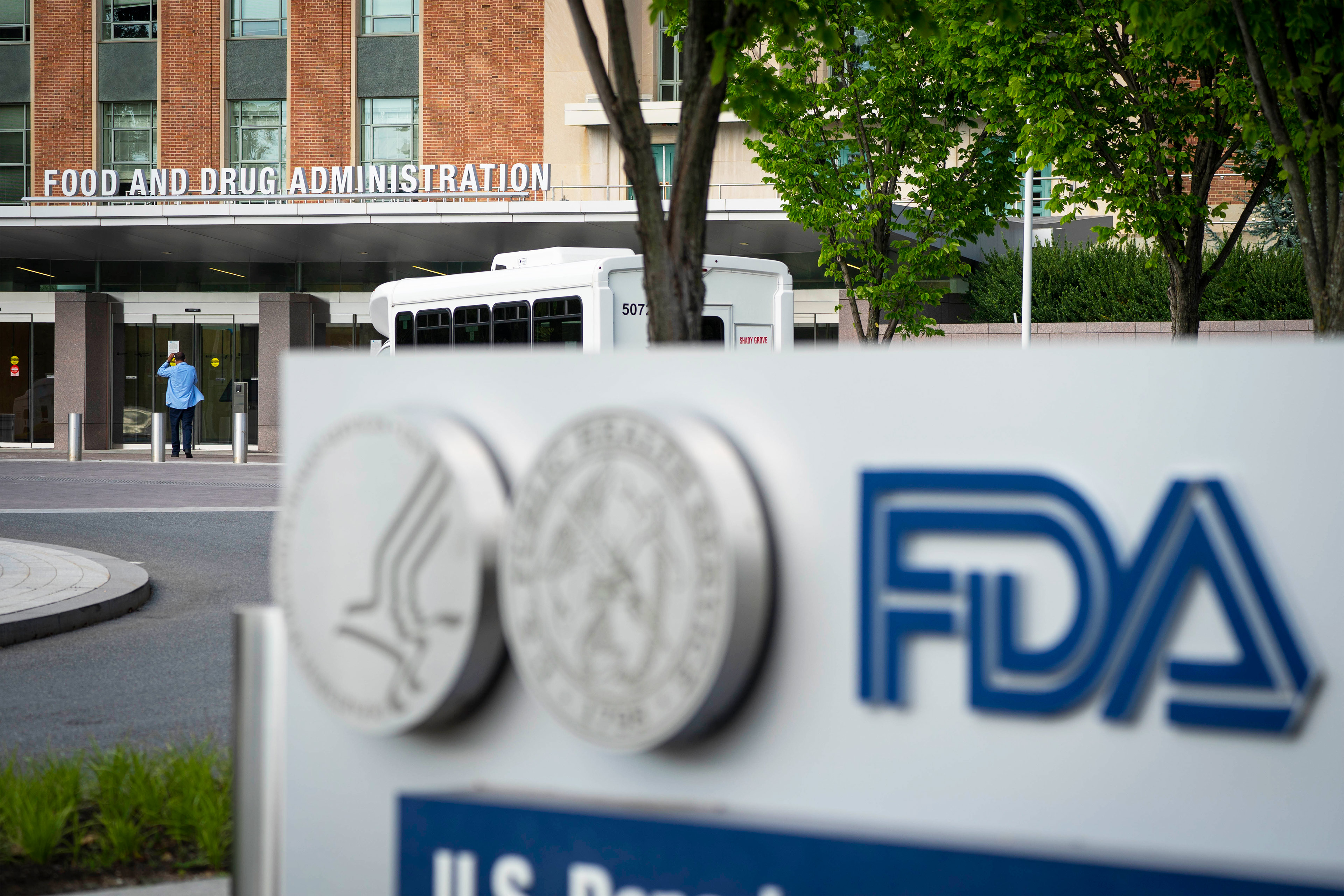 A photo shows a sign outside the FDA headquarters.