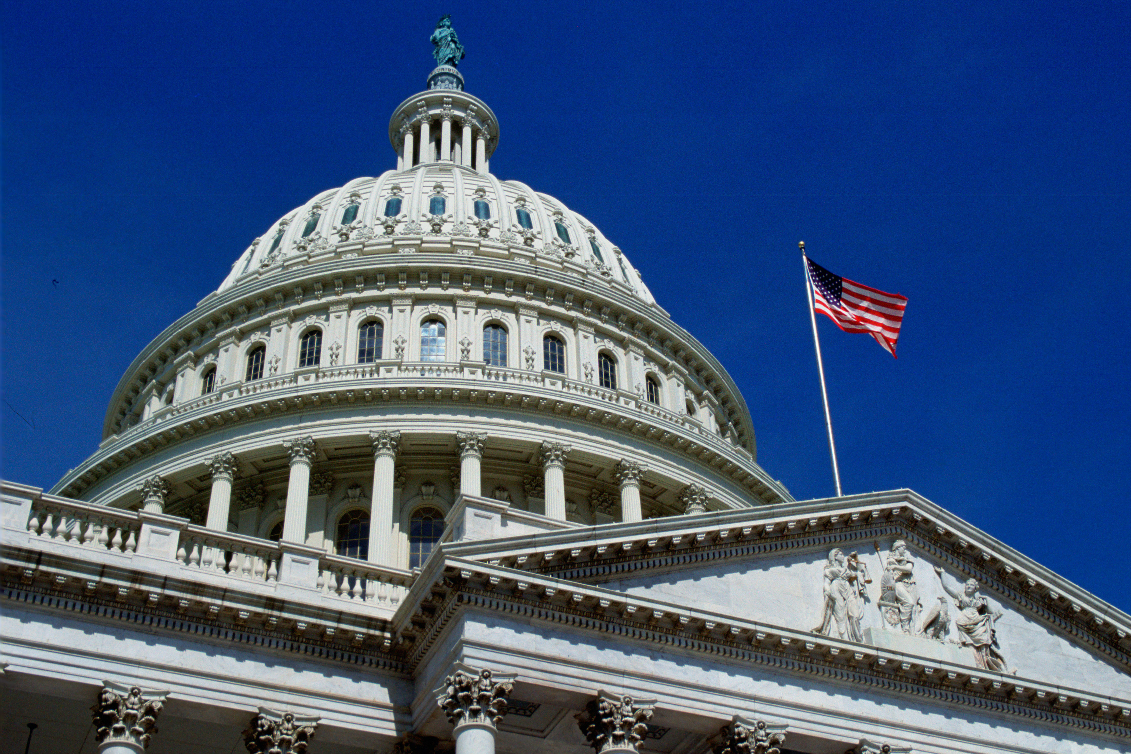 A photo shows the dome at the top of the U.S. Capitol.