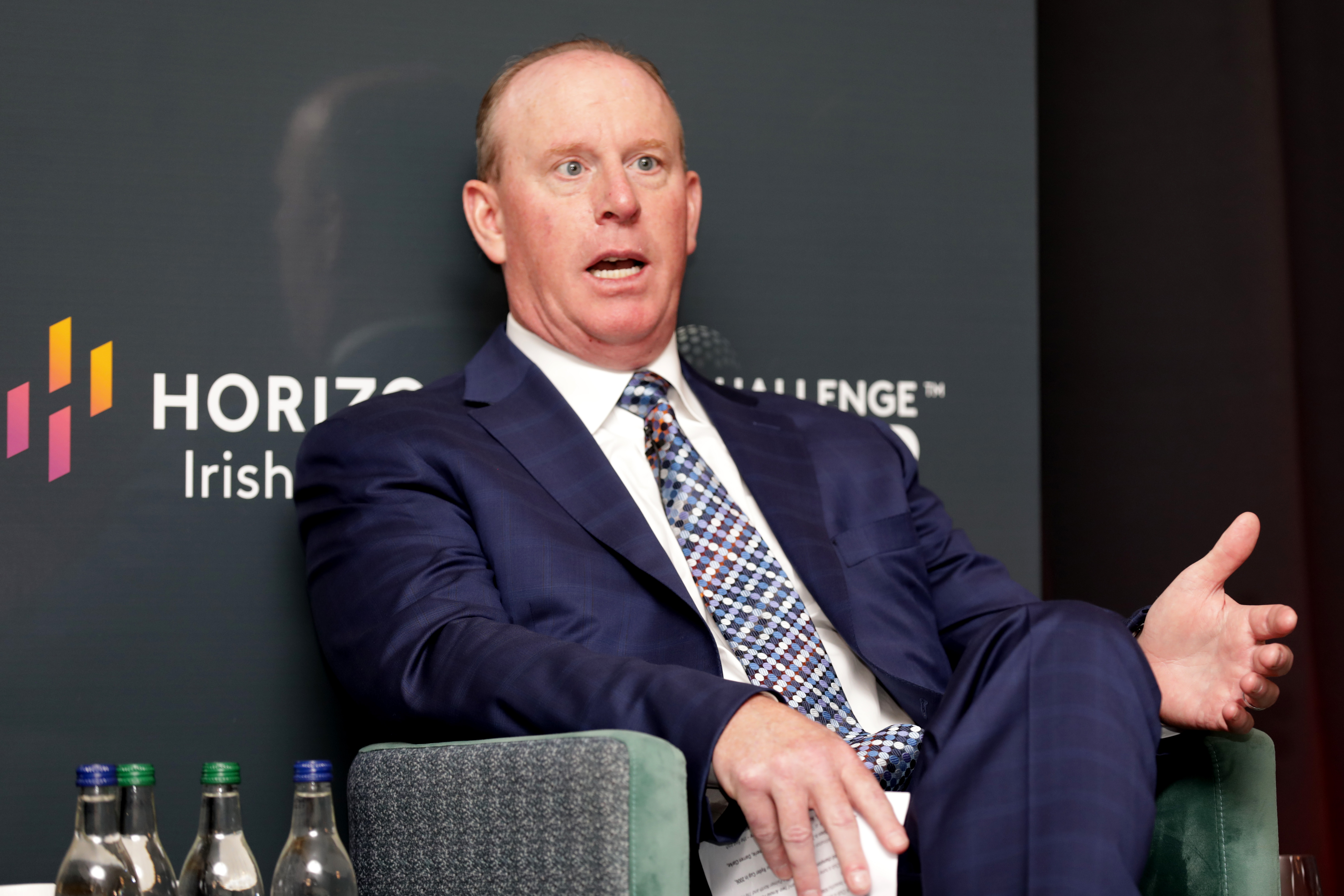 A photo of Horizon Therapeutics' CEO speaking at an event.