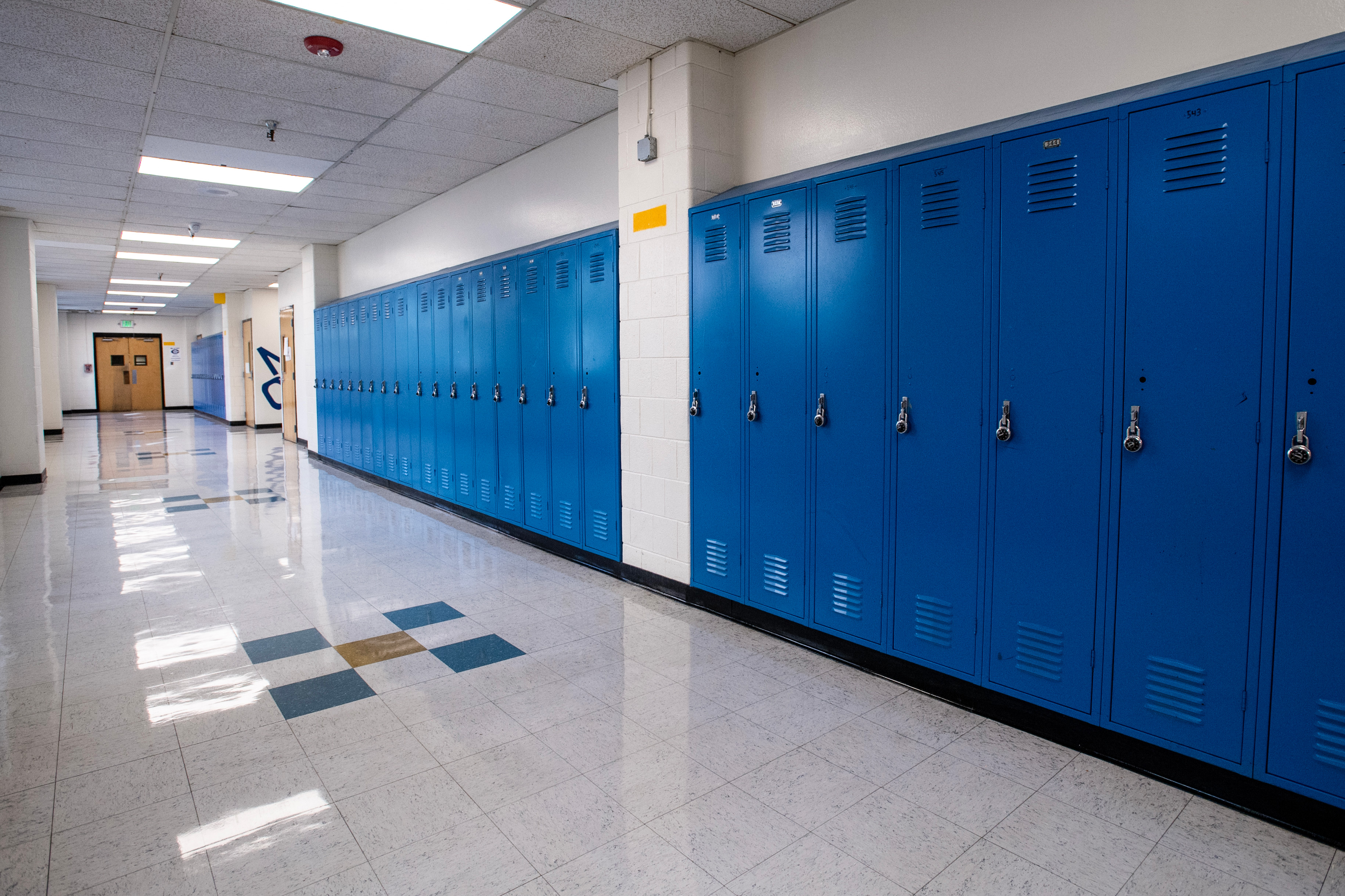 An empty high school hallway.