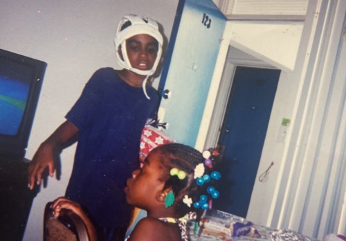 An old photo shows a young Oronde McClain with his sister.