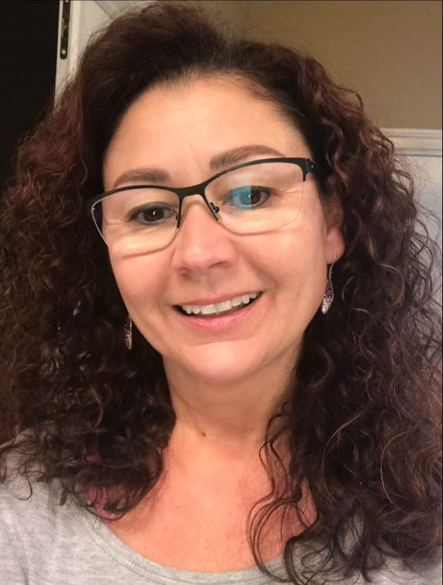 A photograph of Tammy Brady from the shoulders up.