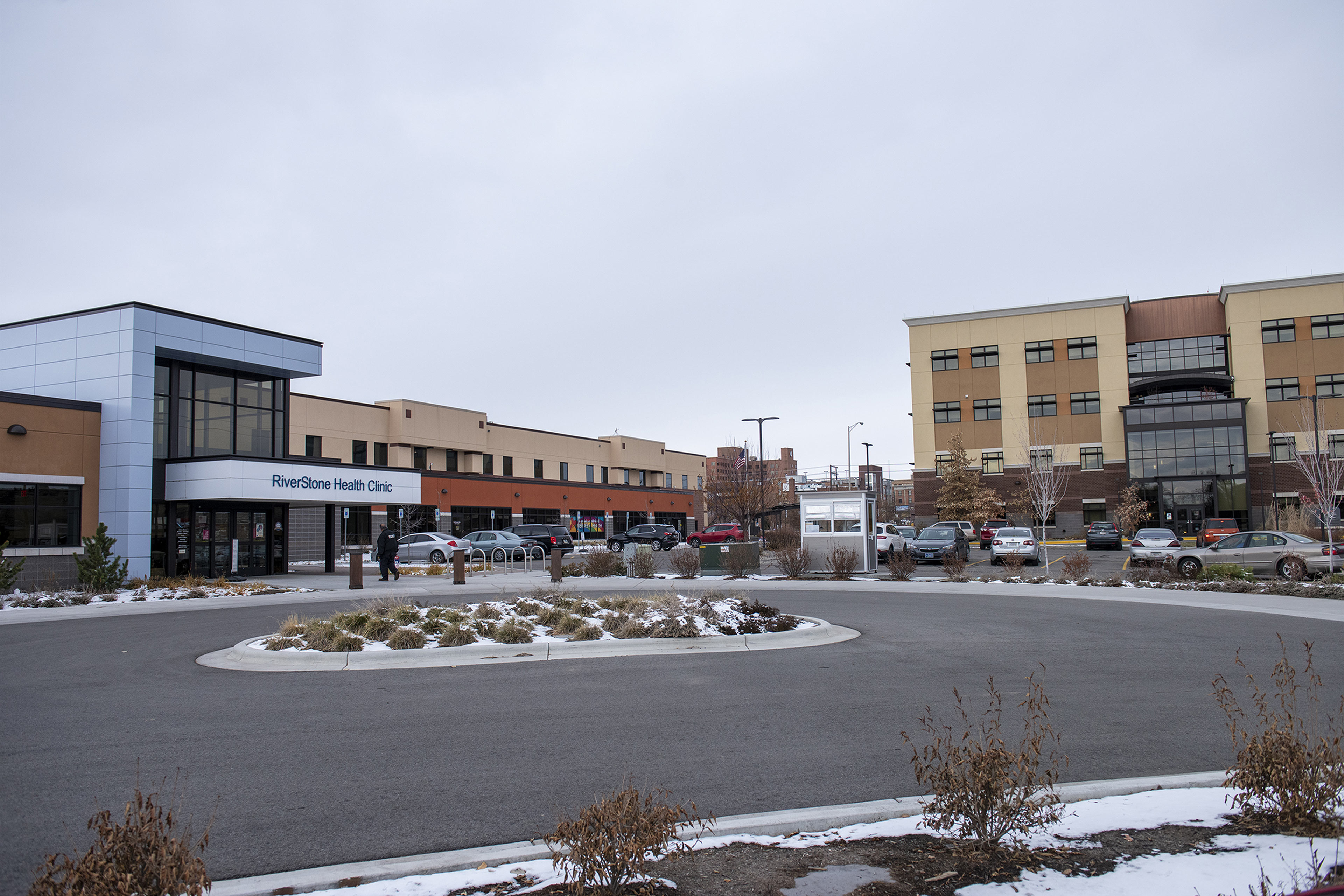 An exterior of a clinic building from the parking lot.