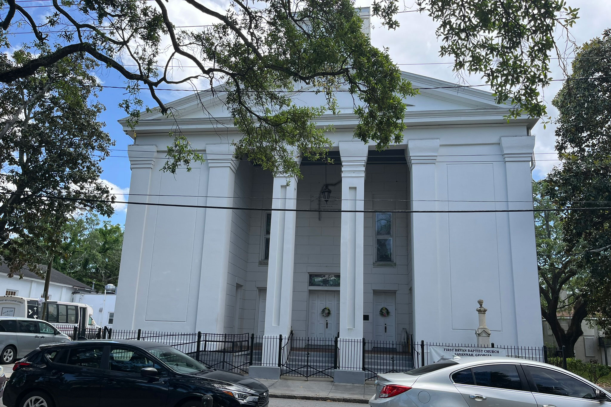 A large church building painted white.