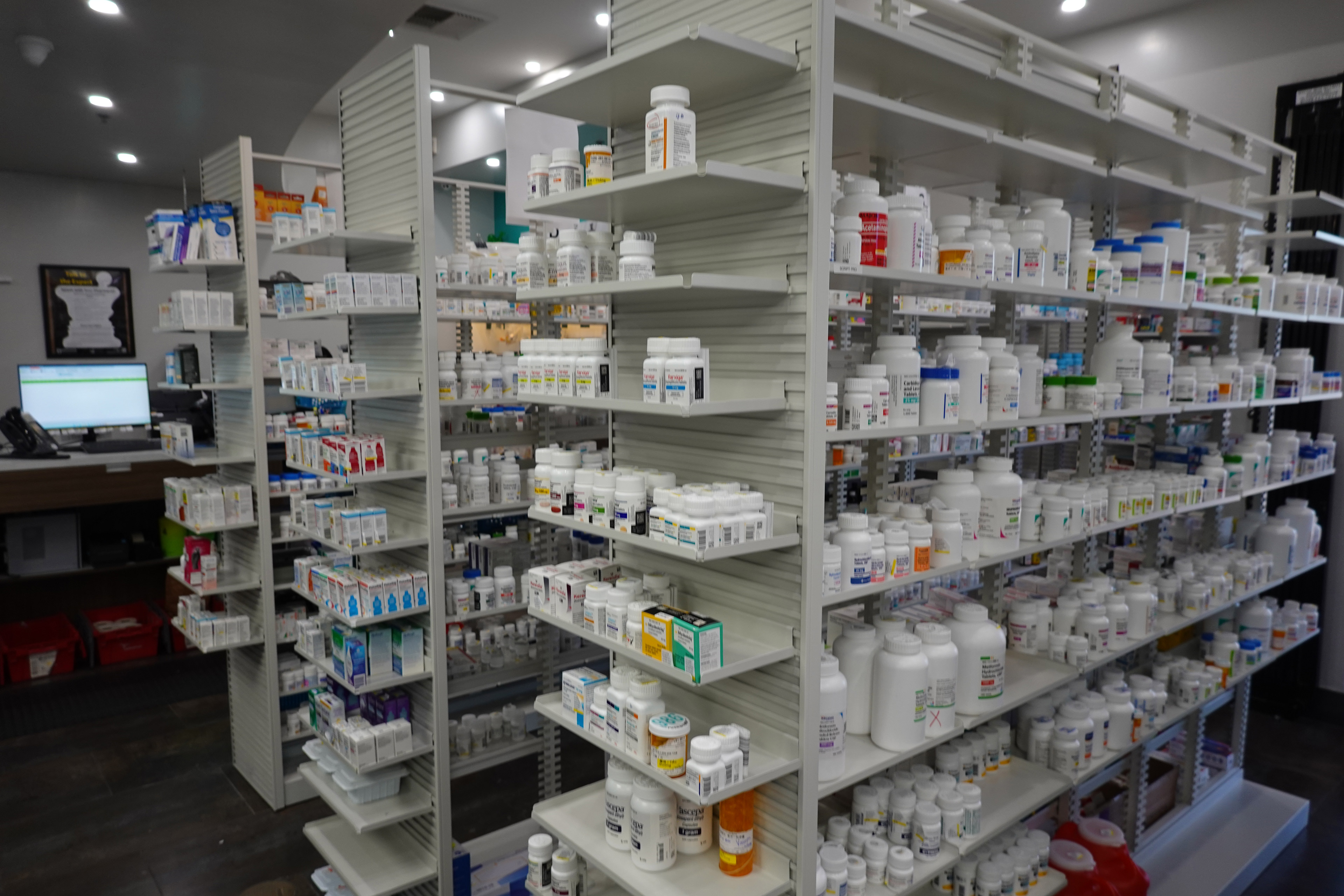 A photo of an area in a pharmacy with filled prescriptions.
