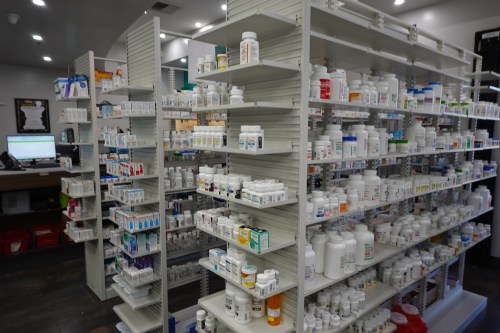 A photo of an area in a pharmacy with filled prescriptions.