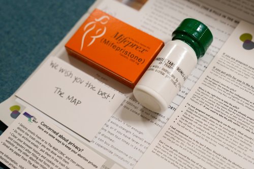 A photo of a mail package containing mifepristone and misoprostol.