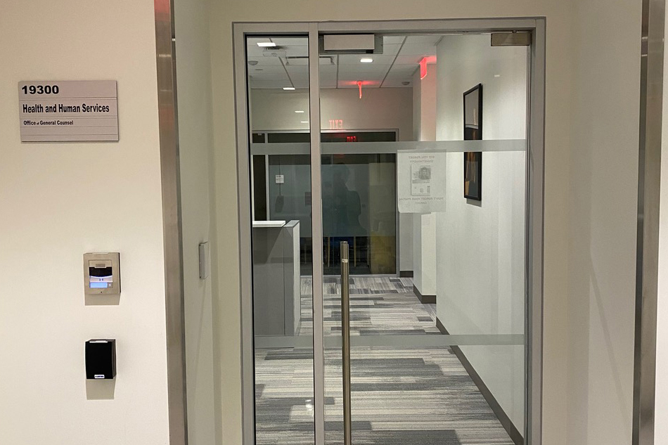 A photo of an empty office hallway.