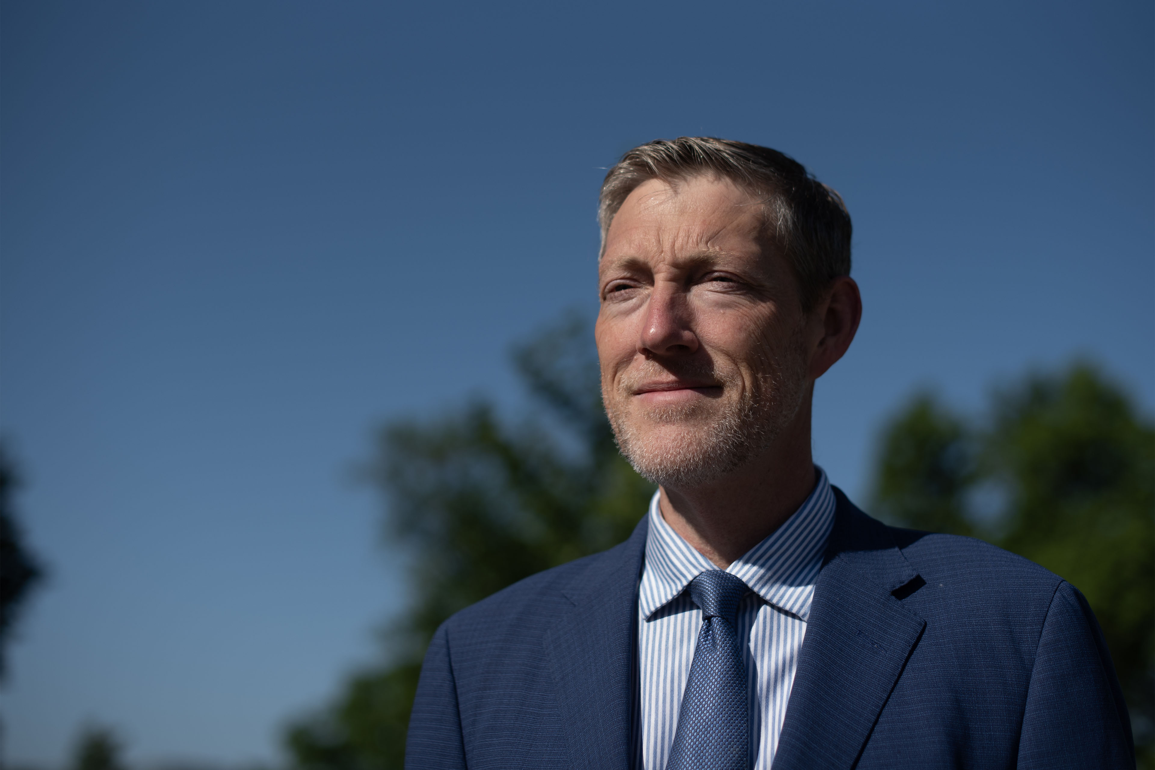 A photo of Scott Pace standing outside in bright sunlight.