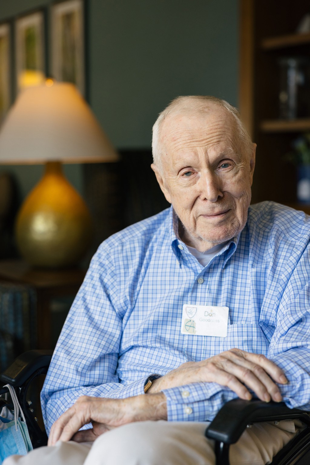 A portrait of a senior man with a gentle smile.