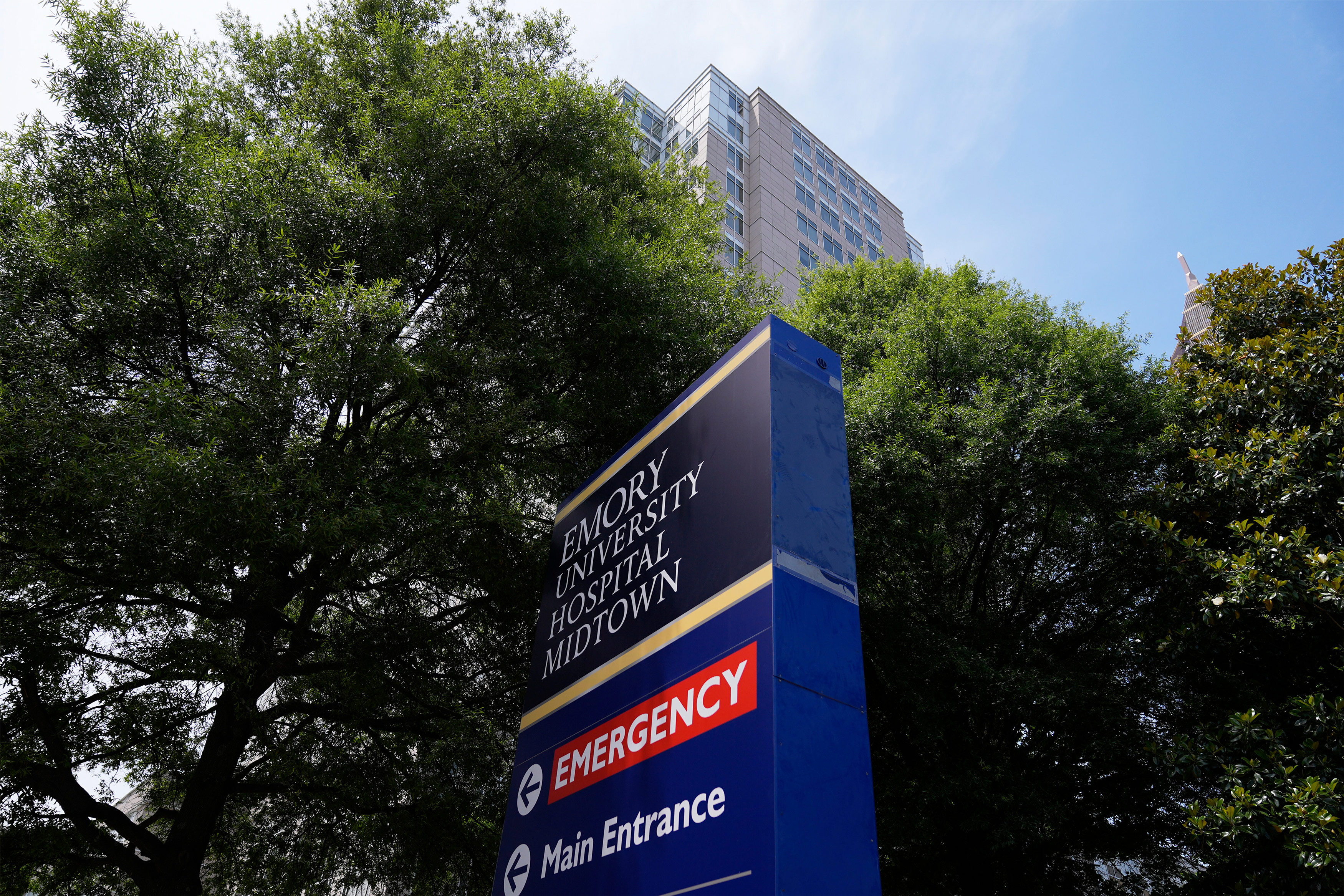 A photo of a sign outside of the Emory University Hospital emergency room.