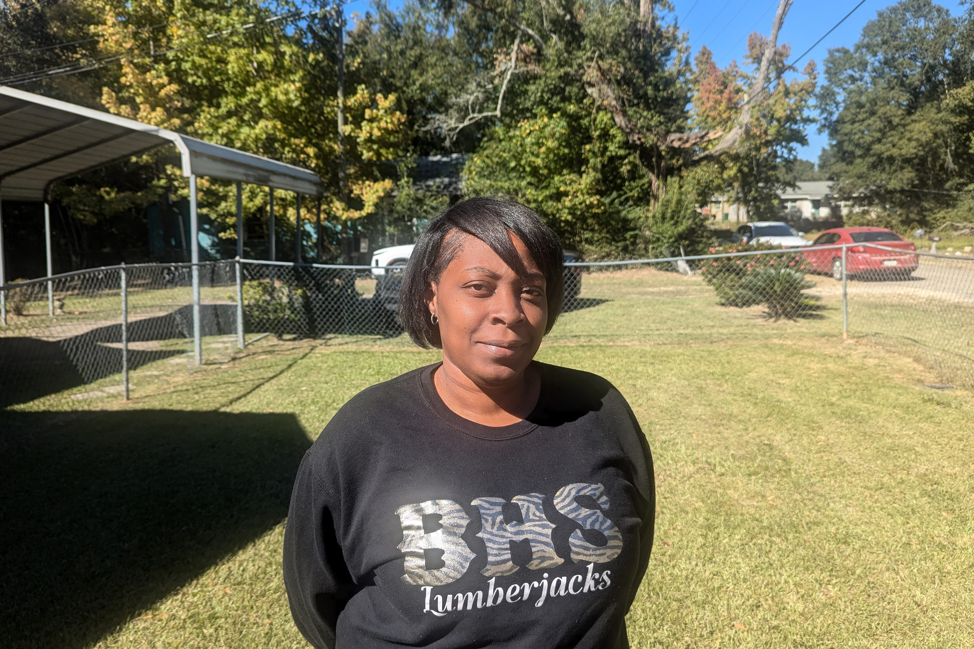 A photo of a Black woman standing outside in Bogalusa, Louisiana.