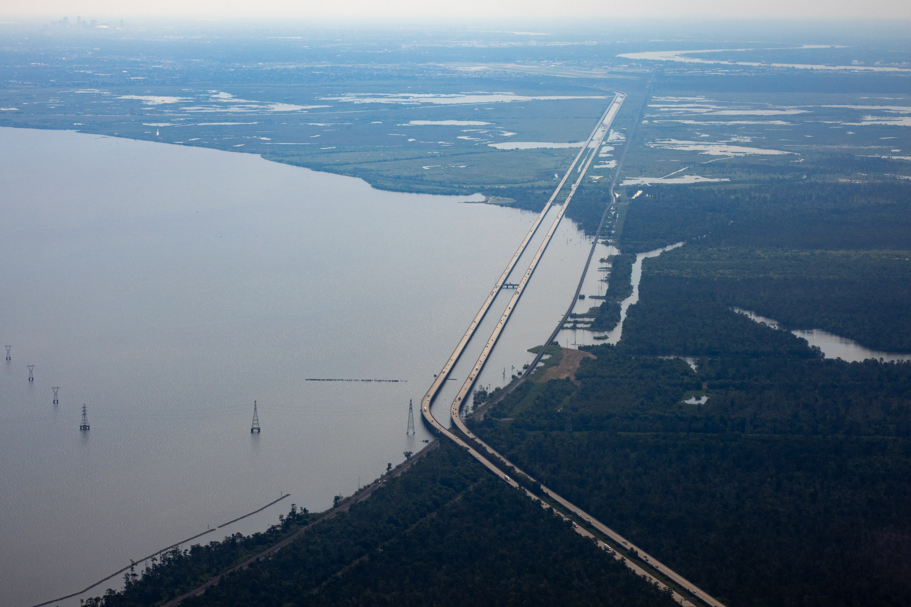 A wide shot of a bridge spanning over water.