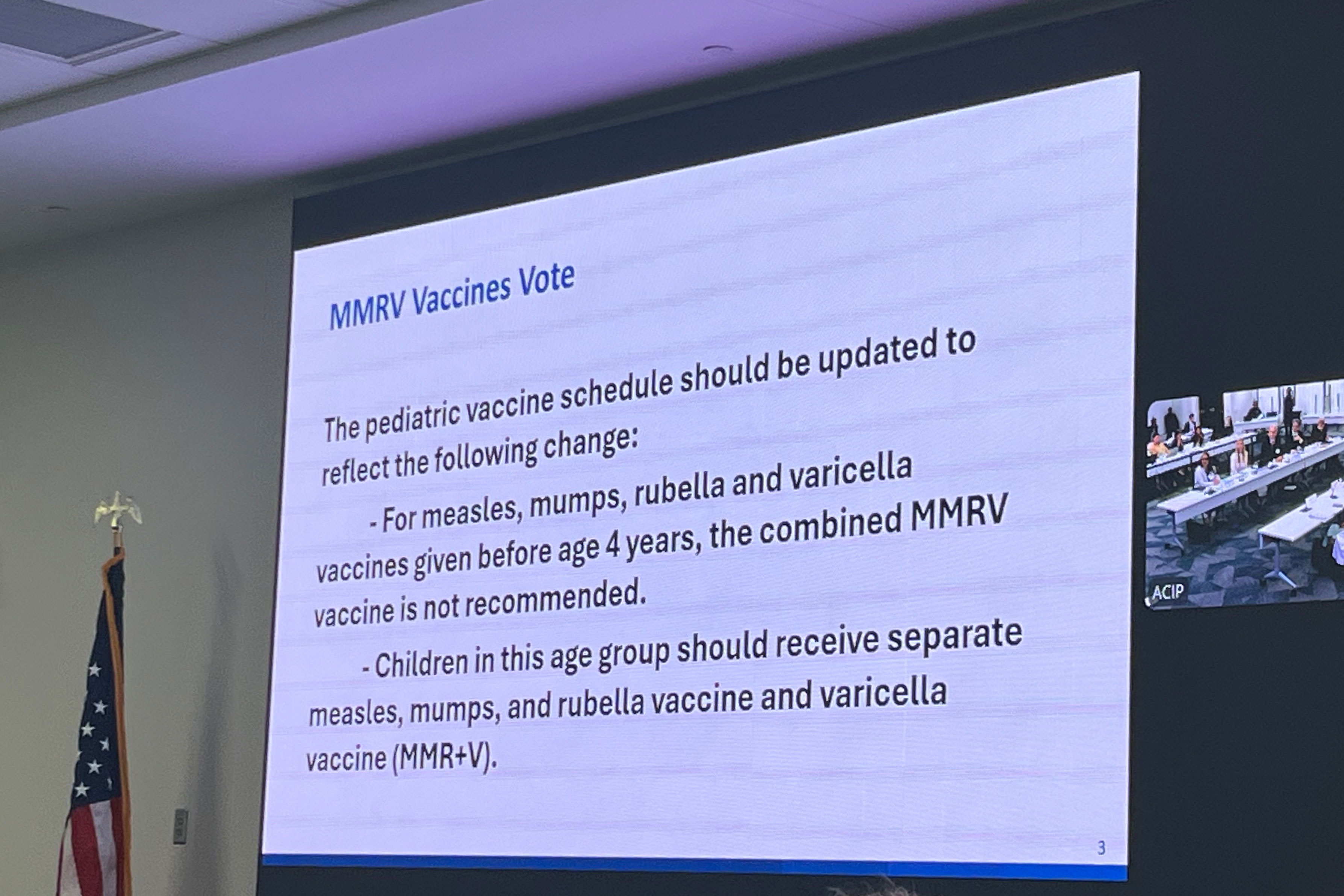 A projected slide reads: "MMRV Vaccines Vote. The pediatric vaccine schedule should be updated to reflect the following change: For measles, mumps, rubella and varicella vaccines given before age 4 years, the combined MMRV vaccine is not recommended. Children in this age group should receive separate measles, mumps, and rubella vaccine and varicella vaccine (MMR+V)"