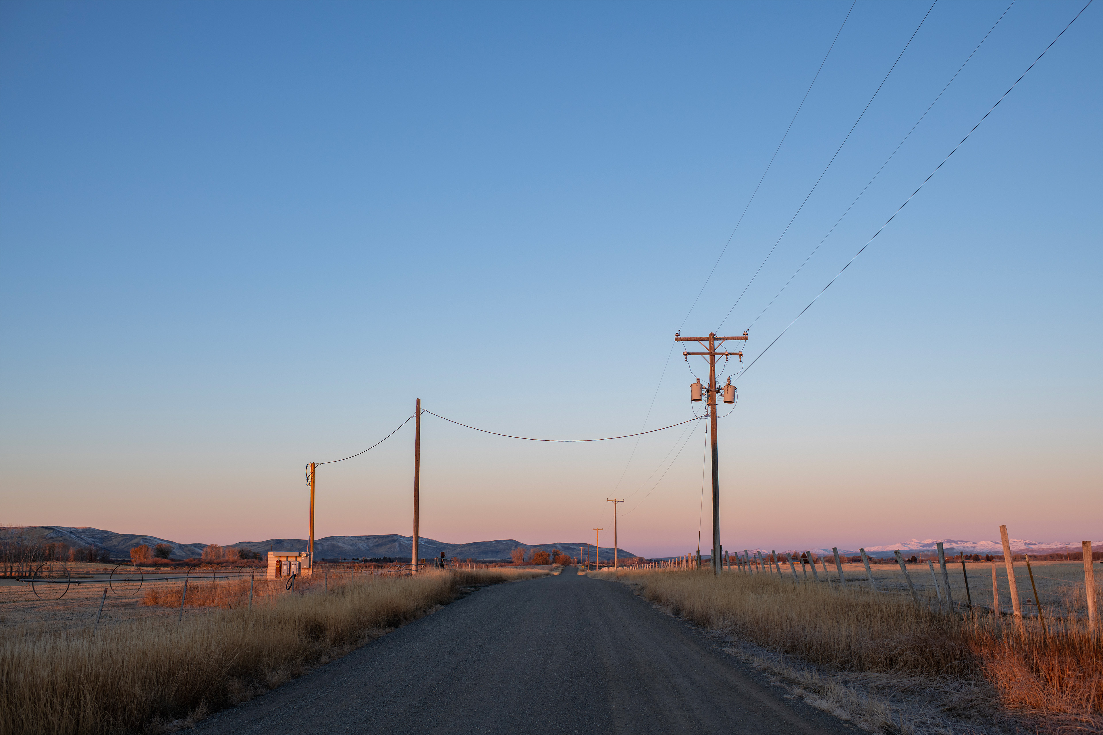 A photo of a rural road.
