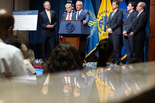 A photo of a news conference featuring Robert F. Kennedy Jr., Mehmet Oz, and Sen. Roger Marshall.