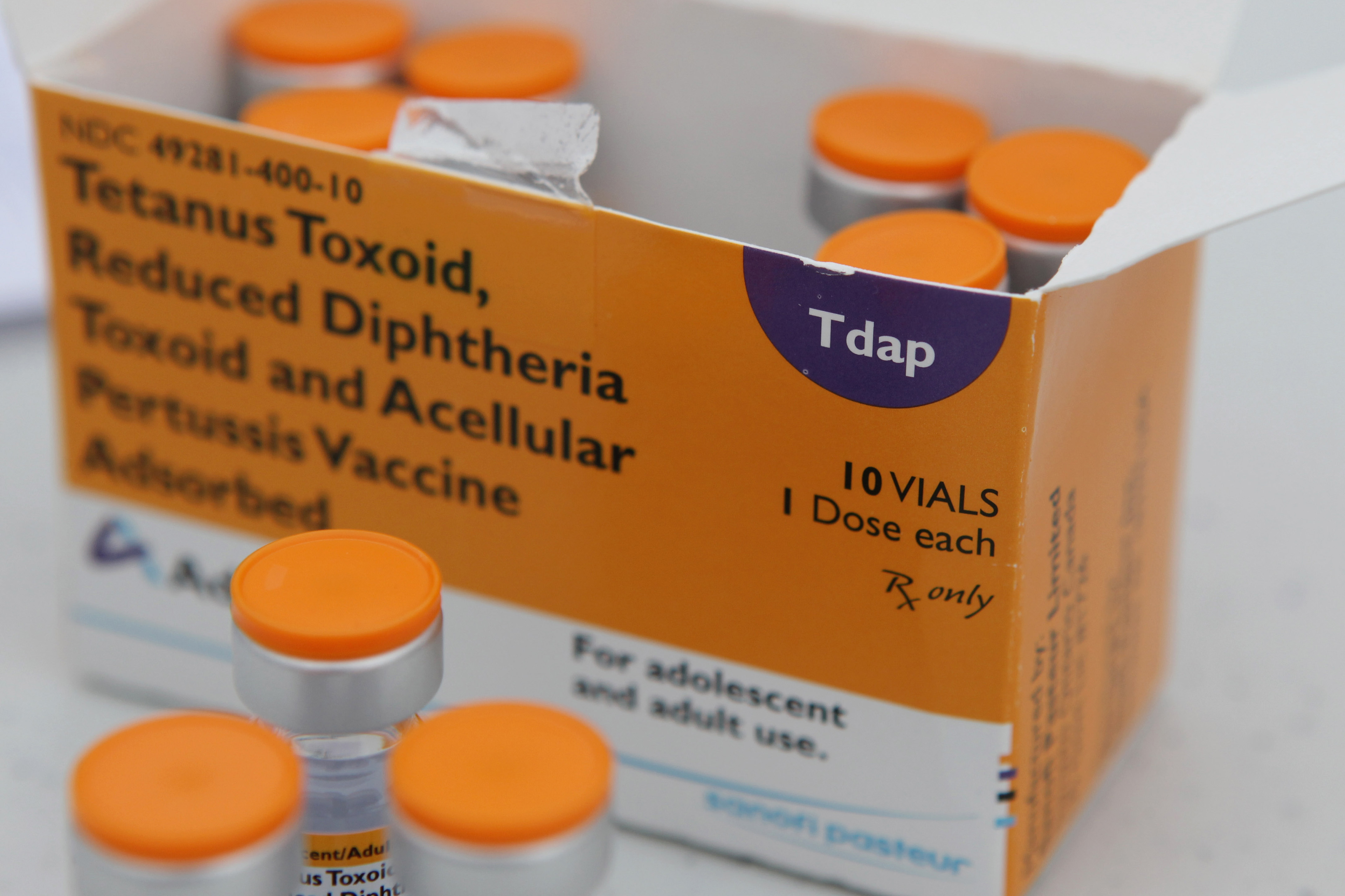 A box of 10 Tdap vaccine vials is shown