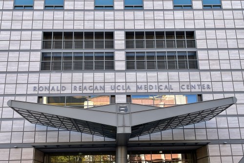 A building entrance with signage that says "Ronald Reagan UCLA Medical Center"