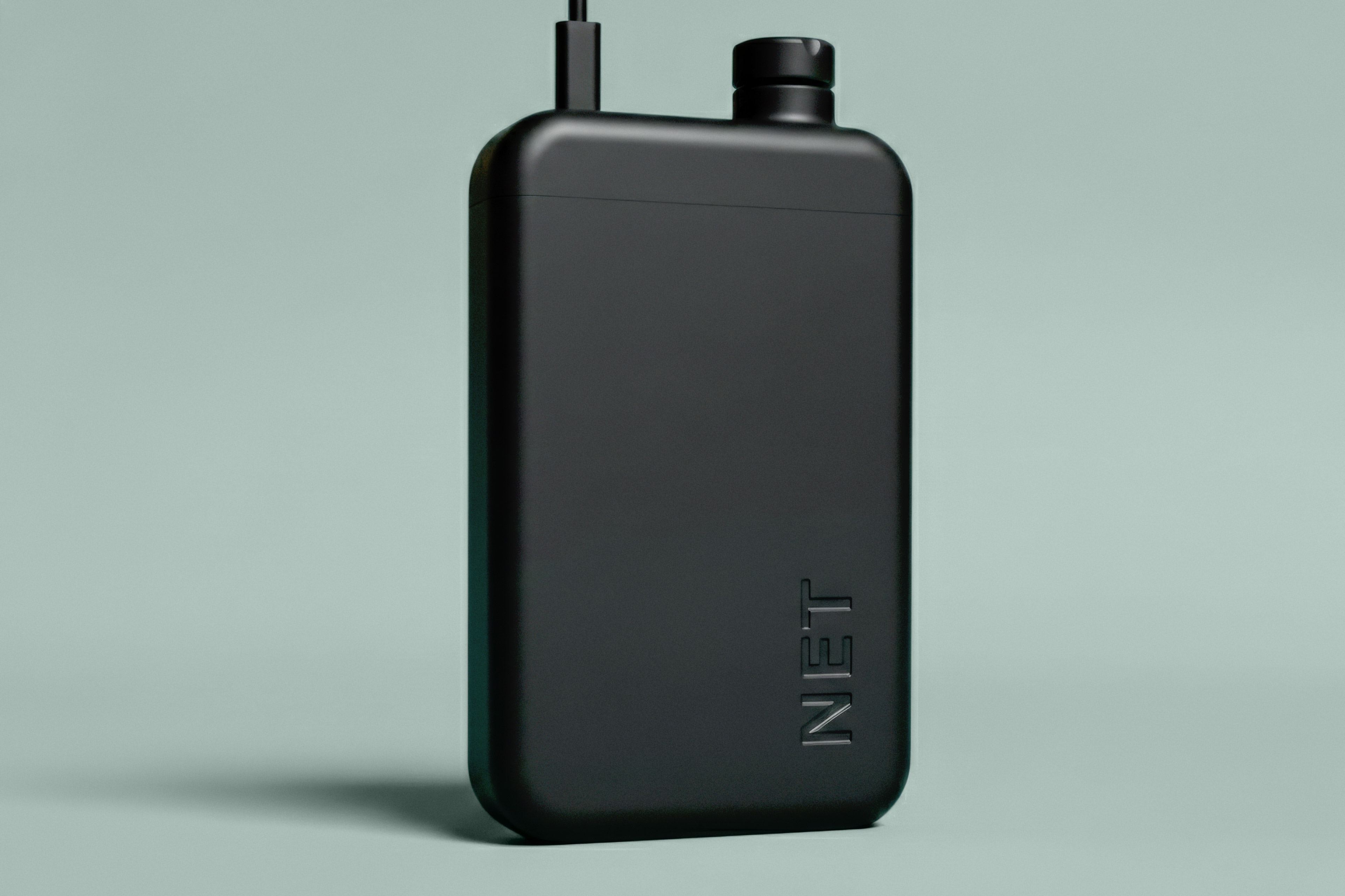 A device that looks like a small portable phone charger with a cord and dial on top of it.
