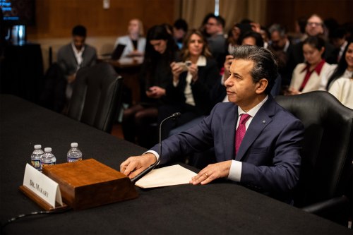 Marty Makary sits at a desk in a Senate hearing room.