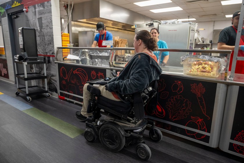 Erica Carter is seen next to the cafeteria in a school building.