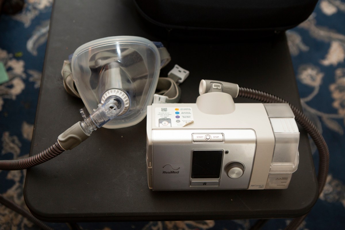 A medical device used for obstructive sleep apnea sits on a table.