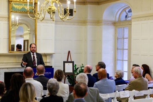 A photo of Paul Nestadt speaking to an audience.