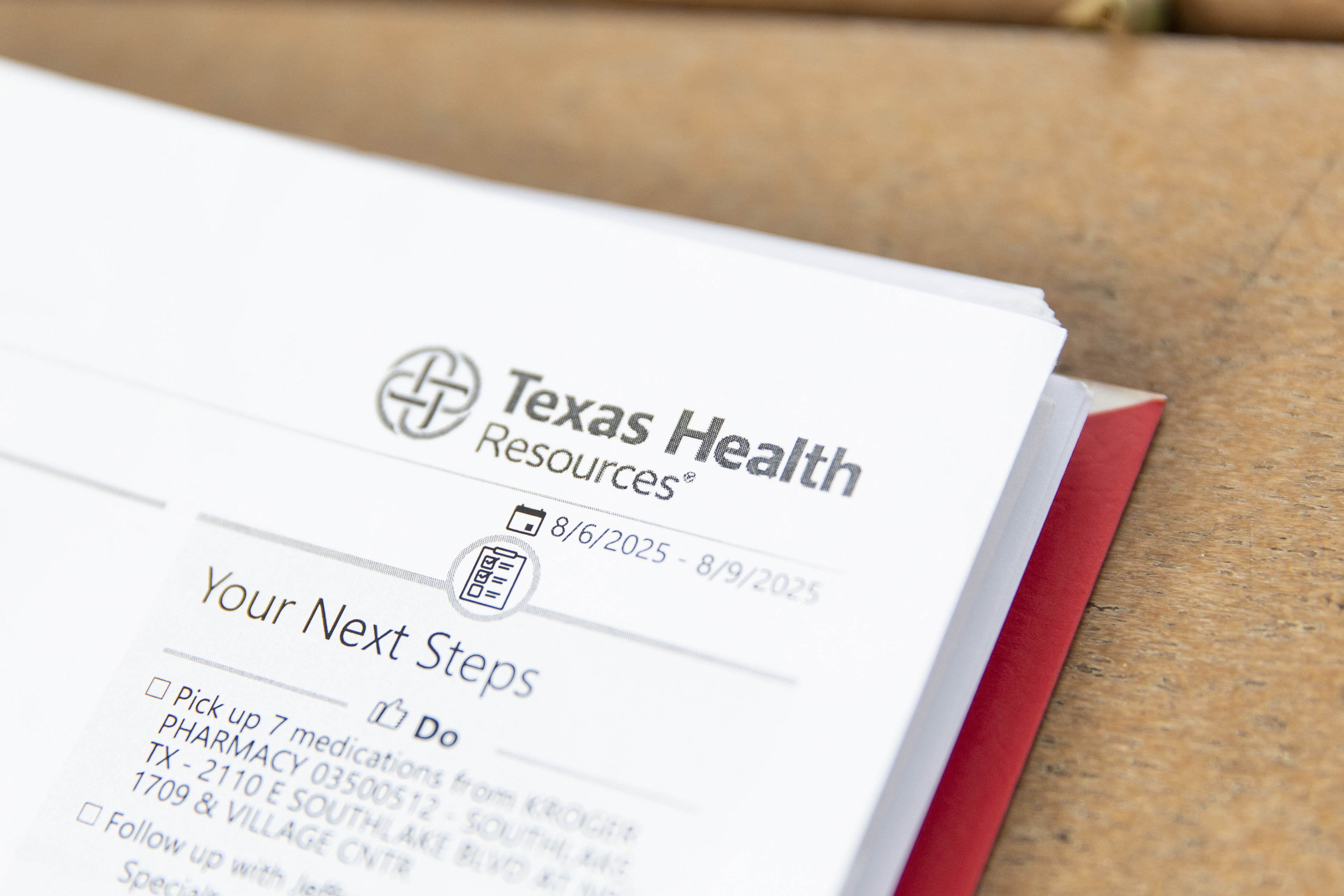 The corner of paperwork is shown with the words "Texas Health Resources) in the upper right corner