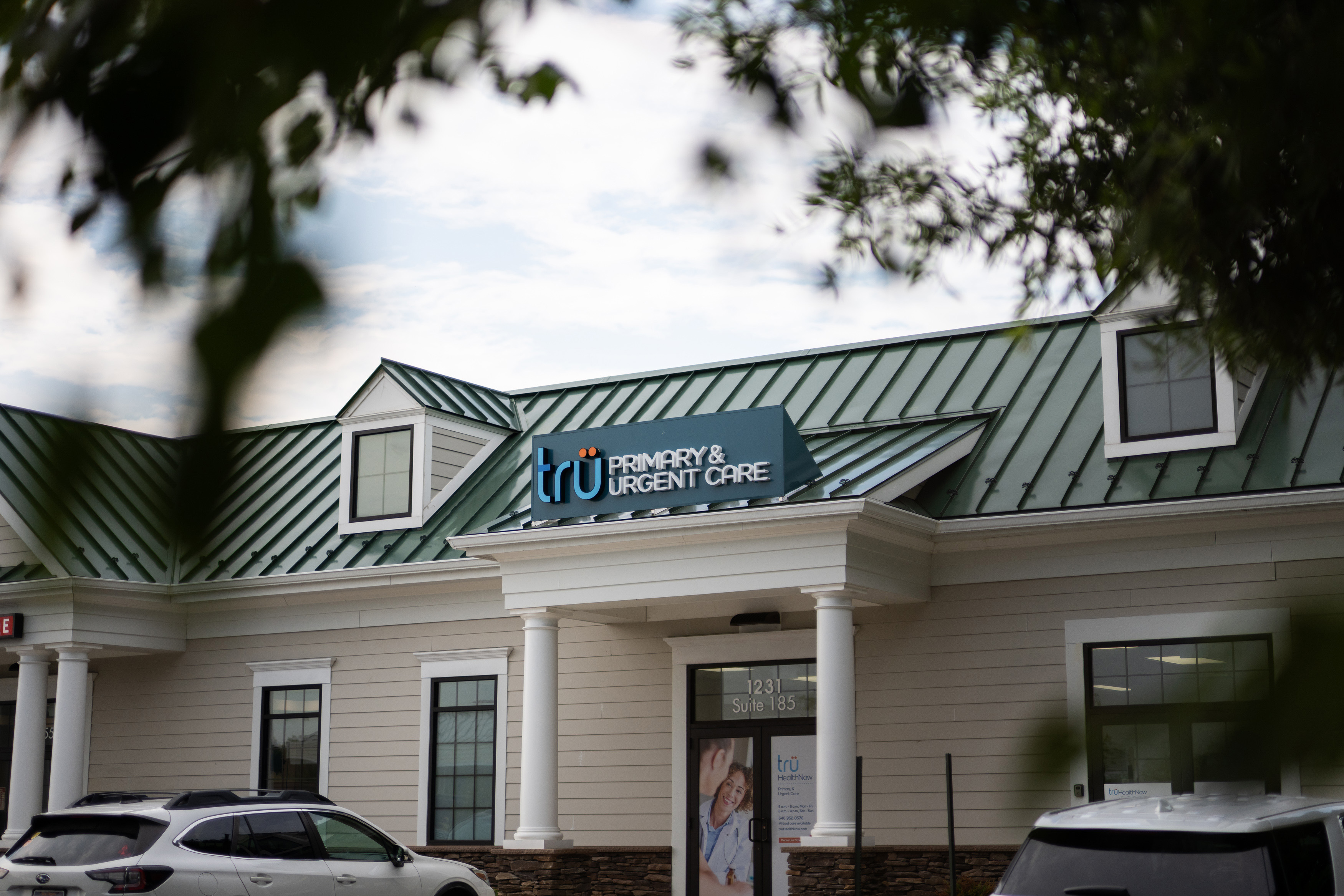 An image of the exterior of a building with signage that reads "Tru Primary & Urgent Care"